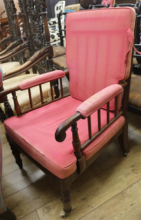 A Victorian mahogany armchair, with open sides